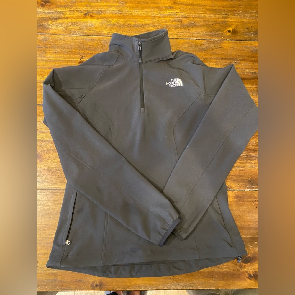 Woman’s stretchy North face quarter zip. Size M